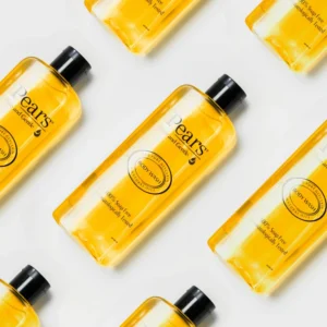 Gold body oil bottles